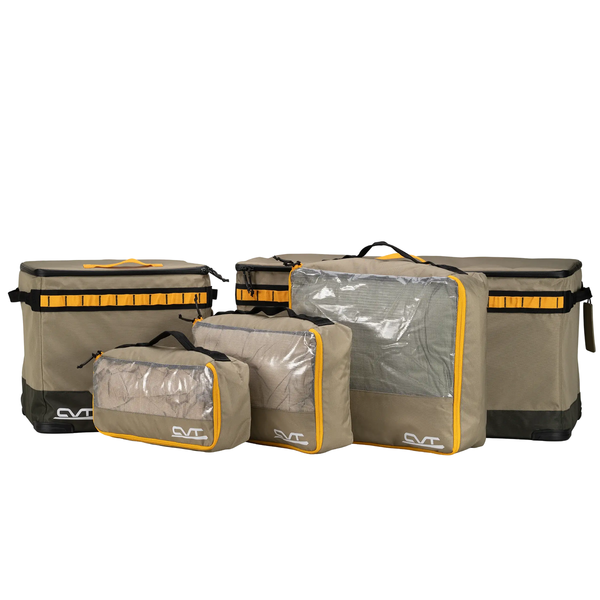 Five CVT Soft Side Storage™ bags in tan and black, featuring yellow trim and clear tops, are displayed in a row on a white background. These water-resistant bags come in assorted sizes to conveniently organize your travel essentials.