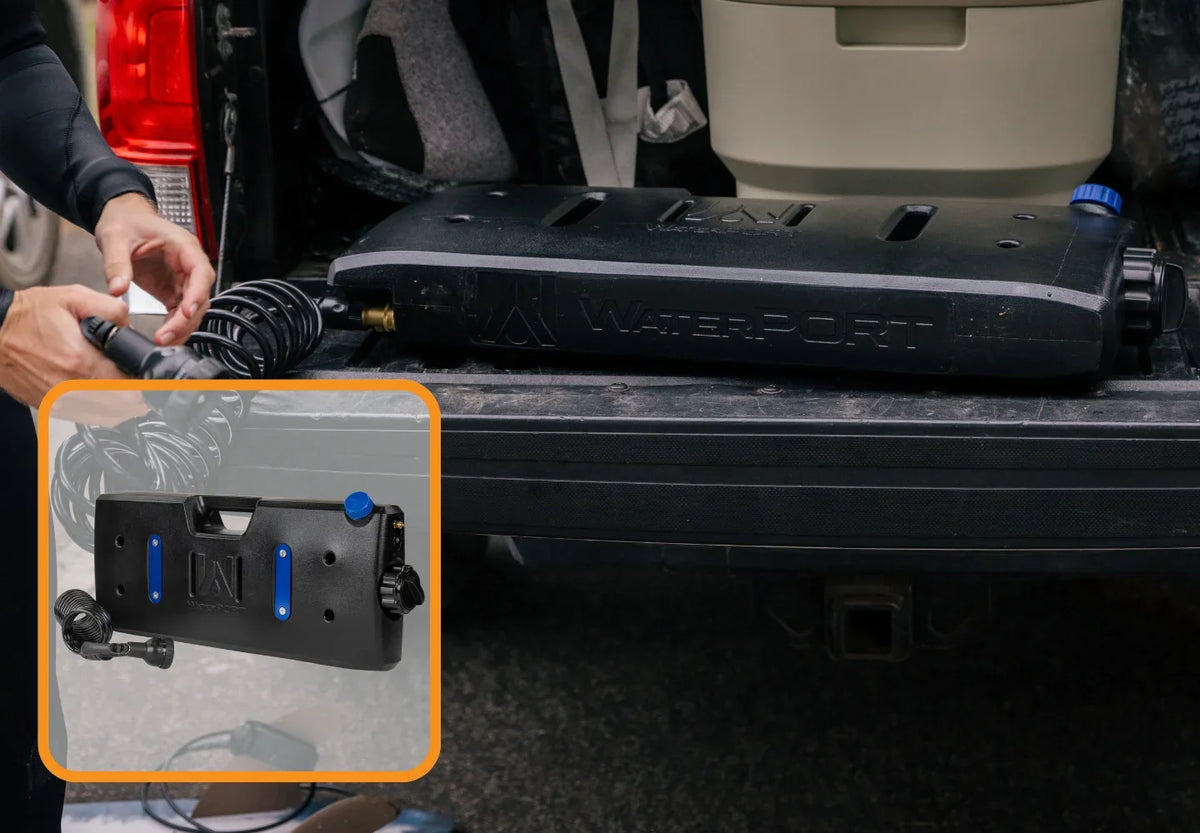 A person installs a black WaterPORT water tank on the open tailgate of a vehicle. An inset image shows a close-up of the tanks mounting bracket and blue valves.