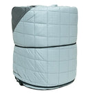 A light gray quilted comforter is rolled up tightly, with a darker gray corner partly visible on top—perfect for cold weather camping or adding extra warmth to CVT’s Pioneer Insulation Walls thanks to their excellent insulation.