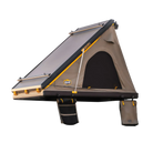 The CVT Mt. Hood 2 Hardshell Tent, designed with an angled roof and hard shell, features a side entry door, windows, and integrated storage bags—ideal for outdoor adventures—and is presented against a plain white background.